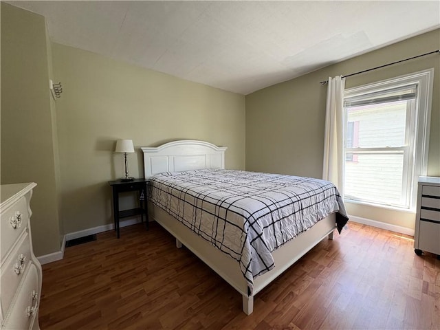 7 E St, Oneonta, NY 13820 - bedroom with wood finished floors and baseboards