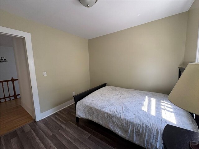 7 E St, Oneonta, NY 13820 - bedroom featuring wood finished floors and baseboards