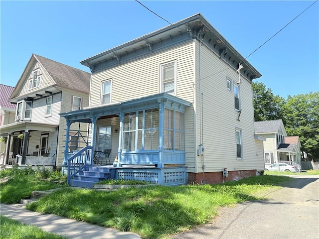 7 E St, Oneonta, NY 13820 - italianate-style house with a porch