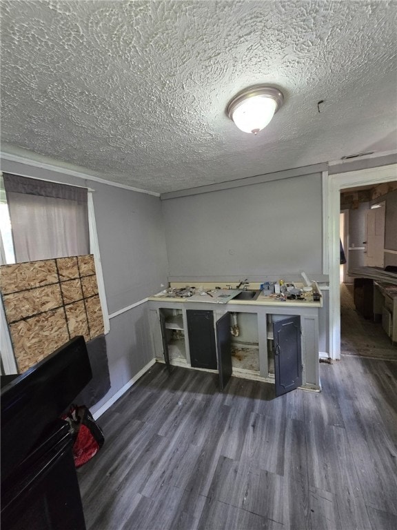 3 Kenmore St, Rochester, NY 14611 - laundry room with wood finished floors and a textured ceiling