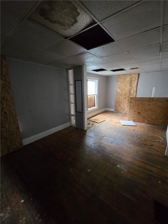 1 W Kenmore St W, Rochester, NY 14611 - basement with hardwood / wood-style flooring and a paneled ceiling