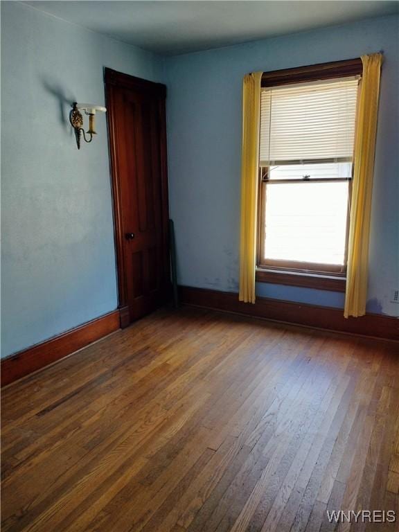 20 Chenango St, Buffalo, NY 14213 - unfurnished room featuring wood finished floors and baseboards