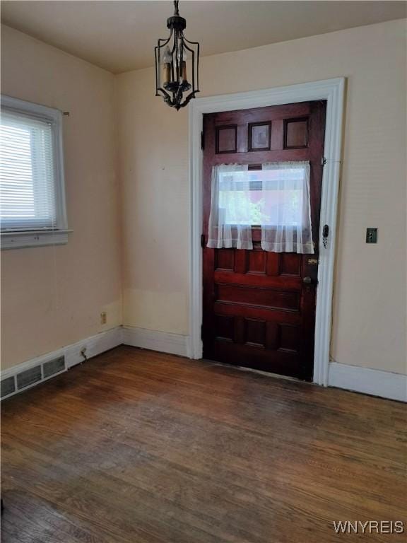 20 Chenango St, Buffalo, NY 14213 - foyer with wood finished floors and a chandelier