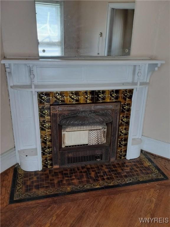 20 Chenango St, Buffalo, NY 14213 - detailed view of a fireplace and baseboards