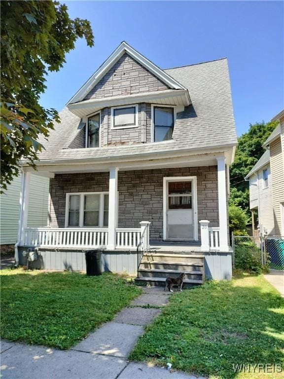 20 Chenango St, Buffalo, NY 14213 - view of front of house featuring a porch and a front yard