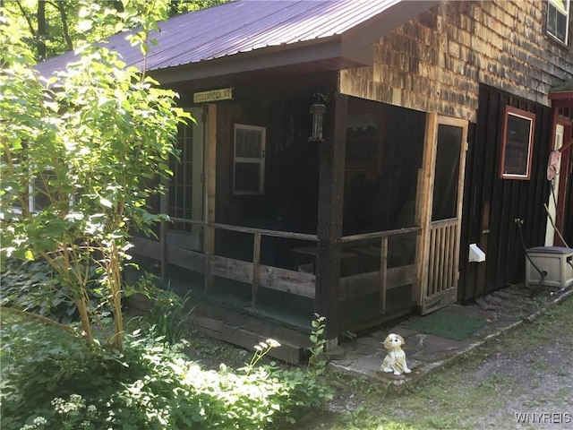 9512 Stillwater Rd, Watson, NY 13367 - view of outbuilding with a sunroom