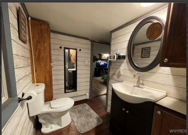 9512 Stillwater Rd, Watson, NY 13367 - bathroom with wood walls, vanity, and wood finished floors