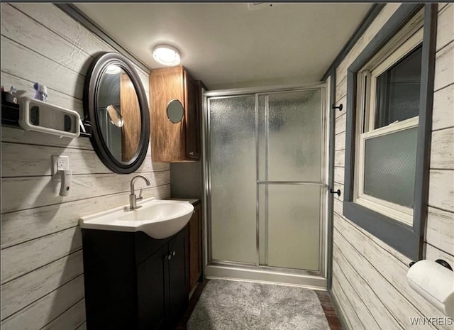 9512 Stillwater Rd, Watson, NY 13367 - full bath featuring vanity, a stall shower, and wood walls