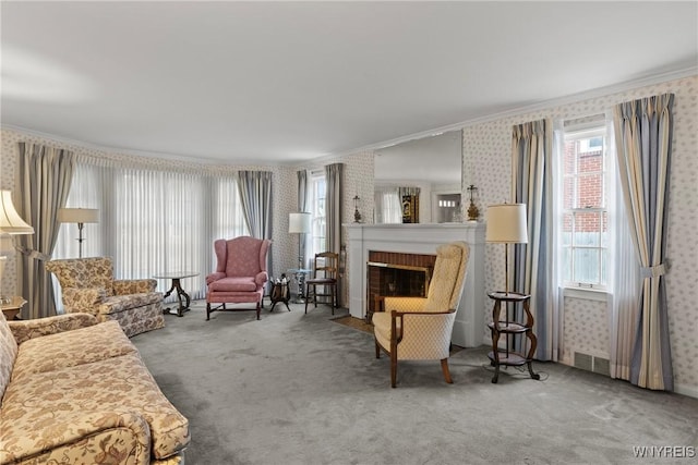 194 Woodridge Ave, Cheektowaga, NY 14225 - carpeted living area featuring crown molding, wallpapered walls, and a fireplace