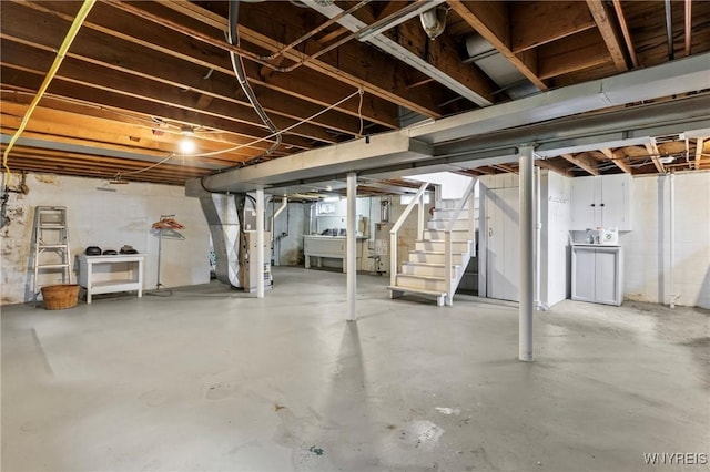 194 Woodridge Ave, Cheektowaga, NY 14225 - unfinished basement featuring stairs and gas water heater