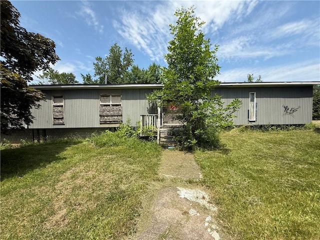 1270 English Rd, Greece, NY 14616 - rear view of property featuring a lawn