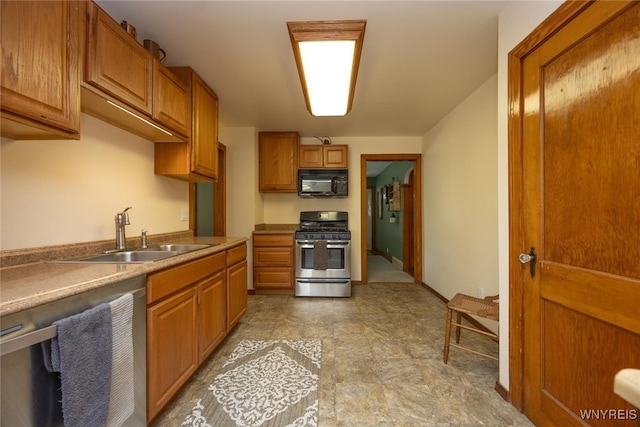 368 Cayuga Creek Rd, Cheektowaga, NY 14227 - kitchen with stainless steel appliances and brown cabinets