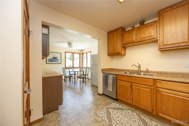 368 Cayuga Creek Rd, Cheektowaga, NY 14227 - kitchen with stainless steel dishwasher, light flooring, freestanding refrigerator, ceiling fan, and brown cabinetry