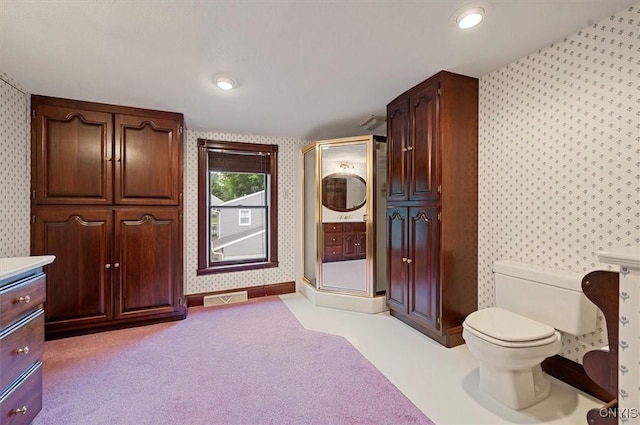 51 State St, Vernon, NY 13421 - bathroom featuring wallpapered walls, a stall shower, washer / dryer, carpet flooring, and vanity