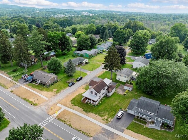 51 State St, Vernon, NY 13421 - aerial perspective of suburban area featuring a heavily wooded area