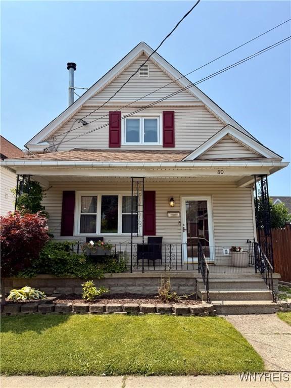 80 Fredro St, Buffalo, NY 14206 - bungalow-style home featuring covered porch and a front yard