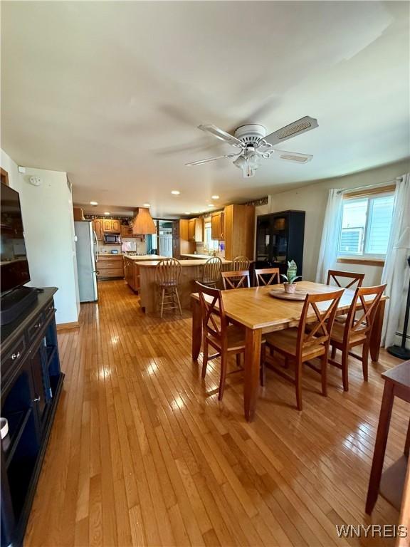 80 Fredro St, Buffalo, NY 14206 - dining room with light wood-type flooring, ceiling fan, and recessed lighting