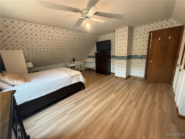 80 Fredro St, Buffalo, NY 14206 - bedroom with wallpapered walls, wood finished floors, ceiling fan, and lofted ceiling