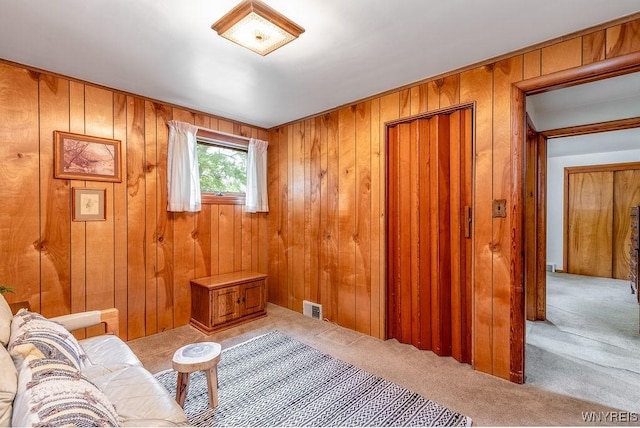 473 Seneca Creek Rd, West Seneca, NY 14224 - sitting room featuring carpet floors and wood walls