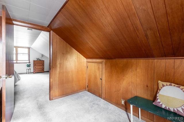 473 Seneca Creek Rd, West Seneca, NY 14224 - bonus room featuring light carpet, lofted ceiling, wood walls, and wooden ceiling