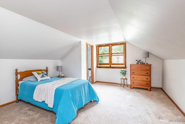 473 Seneca Creek Rd, West Seneca, NY 14224 - bedroom featuring vaulted ceiling and carpet floors