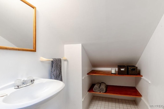 473 Seneca Creek Rd, West Seneca, NY 14224 - bathroom featuring vaulted ceiling