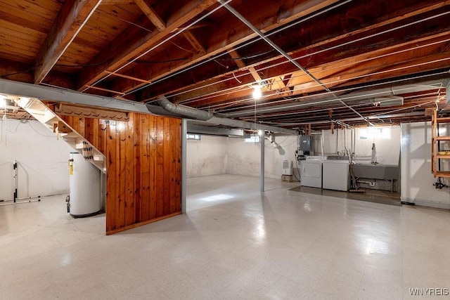 473 Seneca Creek Rd, West Seneca, NY 14224 - basement with water heater, washing machine and clothes dryer, tile patterned floors, and electric panel