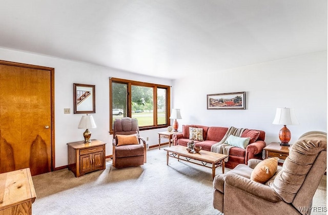 473 Seneca Creek Rd, West Seneca, NY 14224 - living room featuring light colored carpet and baseboards
