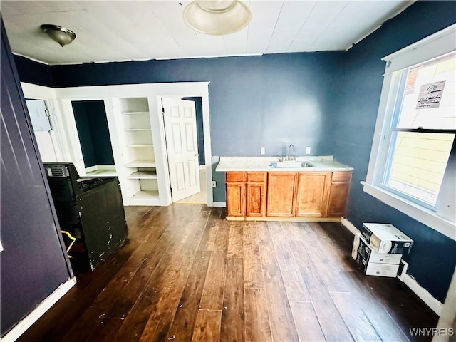 67 Holmes St, Buffalo, NY 14207 - bar area featuring dark wood-style floors, stove, and built in features