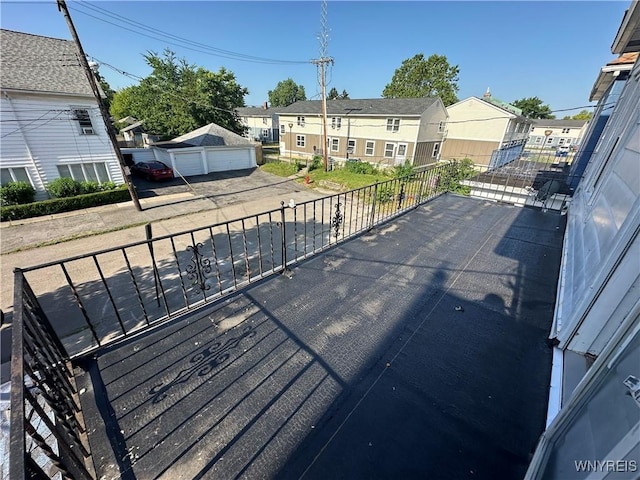 67 Holmes St, Buffalo, NY 14207 - wooden terrace featuring a residential view and a garage