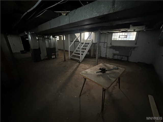 67 Holmes St, Buffalo, NY 14207 - basement with stairway and heating unit