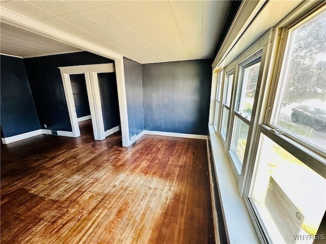 67 Holmes St, Buffalo, NY 14207 - spare room featuring wood finished floors and baseboards