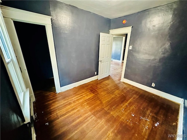 67 Holmes St, Buffalo, NY 14207 - unfurnished room featuring wood finished floors and baseboards