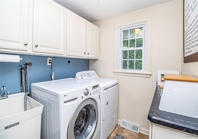 101 Luan Cir, Dewitt, NY 13078 - laundry area featuring cabinet space and washer and dryer