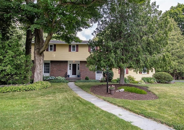 101 Luan Cir, Dewitt, NY 13078 - colonial home with a front lawn and brick siding