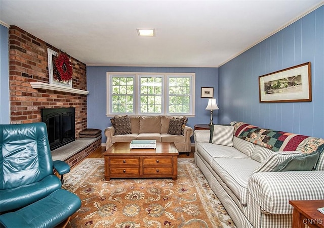 101 Luan Cir, Dewitt, NY 13078 - living room with wood finished floors, crown molding, and a brick fireplace