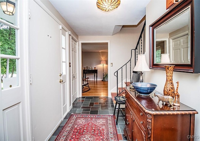 101 Luan Cir, Dewitt, NY 13078 - entrance foyer featuring stone tile floors and stairs