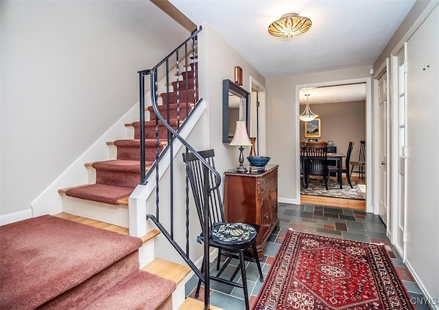 101 Luan Cir, Dewitt, NY 13078 - stairs with baseboards and stone finish floors