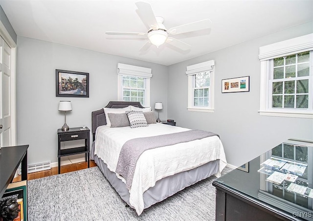101 Luan Cir, Dewitt, NY 13078 - bedroom with wood finished floors and ceiling fan