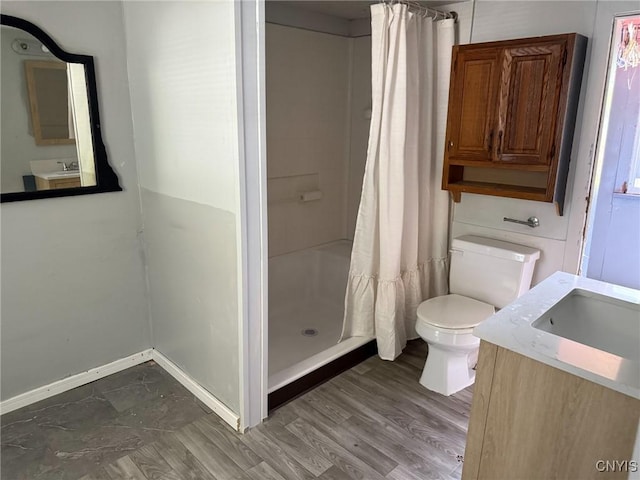231 N Main St, Oneida, NY 13421 - full bath with a shower stall, vanity, and wood finished floors