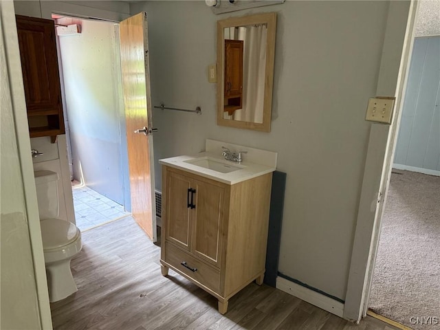 231 N Main St, Oneida, NY 13421 - bathroom with vanity and wood finished floors
