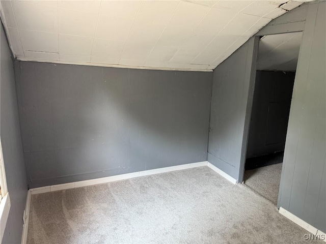 231 N Main St, Oneida, NY 13421 - carpeted spare room with vaulted ceiling and baseboards