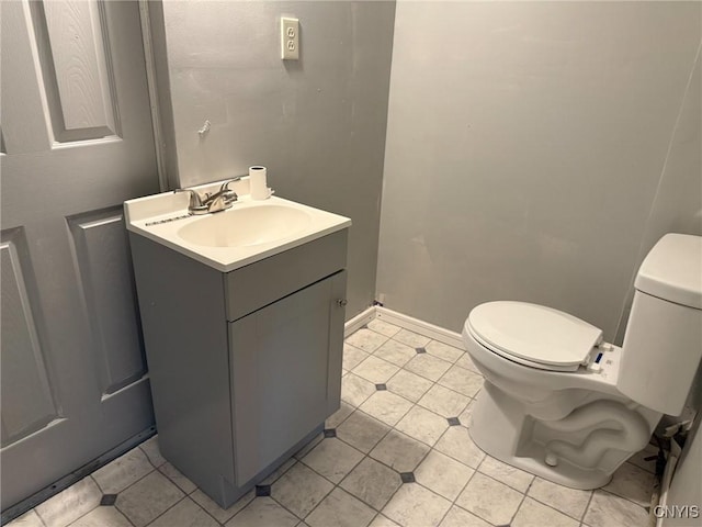231 N Main St, Oneida, NY 13421 - bathroom with vanity and tile patterned flooring