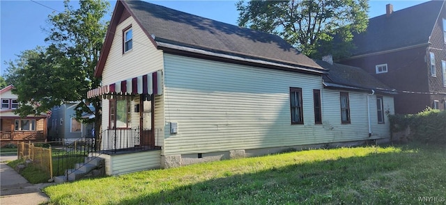 4 Regina Pl, Buffalo, NY 14208 - view of home's exterior with a lawn, crawl space, and roof with shingles