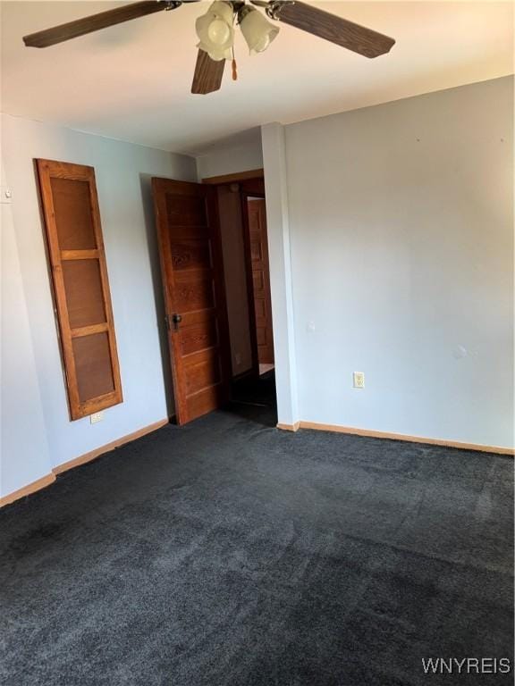 45 Clio Ave, Buffalo, NY 14220 - unfurnished bedroom with dark carpet and ceiling fan