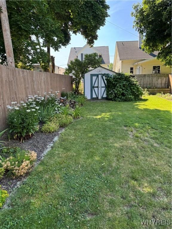 45 Clio Ave, Buffalo, NY 14220 - view of yard with a storage unit
