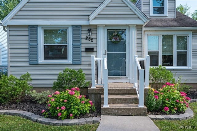 282 N Wrexham Ct, Tonawanda, NY 14150 - entrance to property featuring roof with shingles
