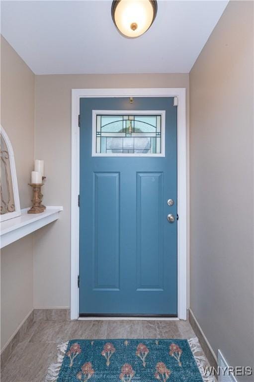 282 N Wrexham Ct, Tonawanda, NY 14150 - entrance foyer featuring baseboards