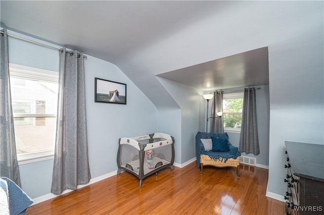 282 N Wrexham Ct, Tonawanda, NY 14150 - sitting room with wood finished floors and lofted ceiling
