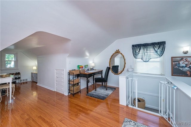 282 N Wrexham Ct, Tonawanda, NY 14150 - home office with light wood-style flooring and lofted ceiling